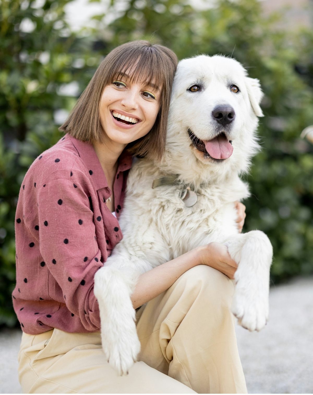 Happy woman with her dog.